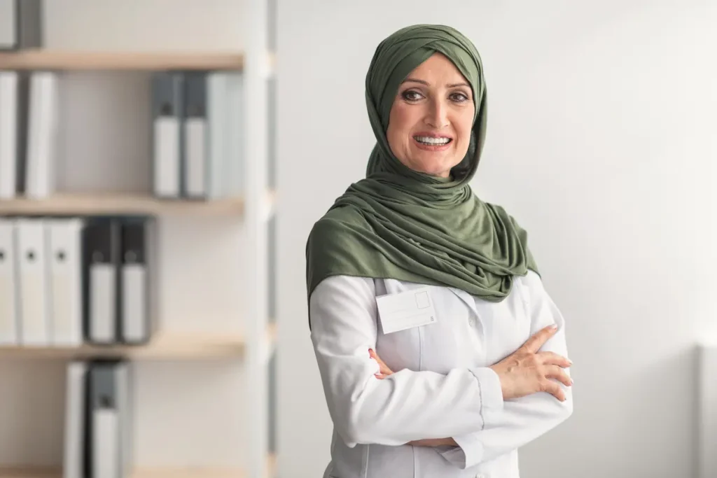 muslim doctor woman wearing hijab posing in clinic office cz
